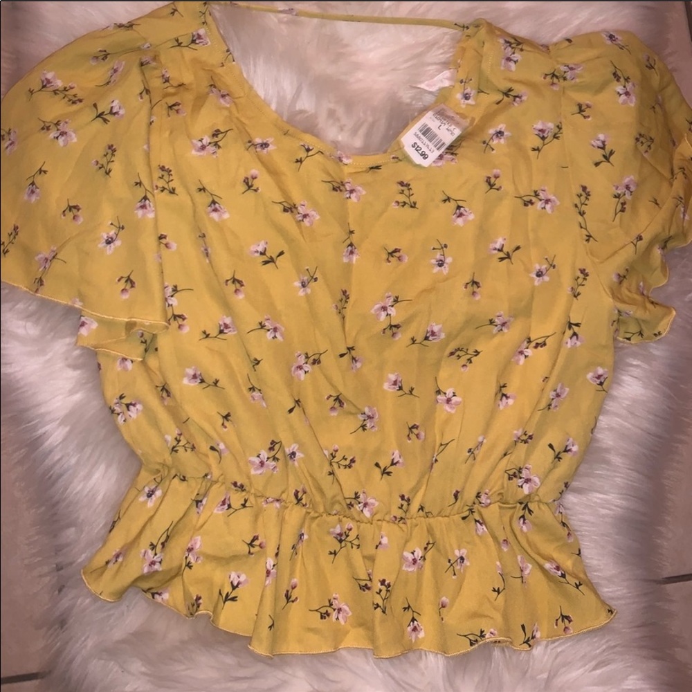 New Yellow shirt with pink flowers. Size L.